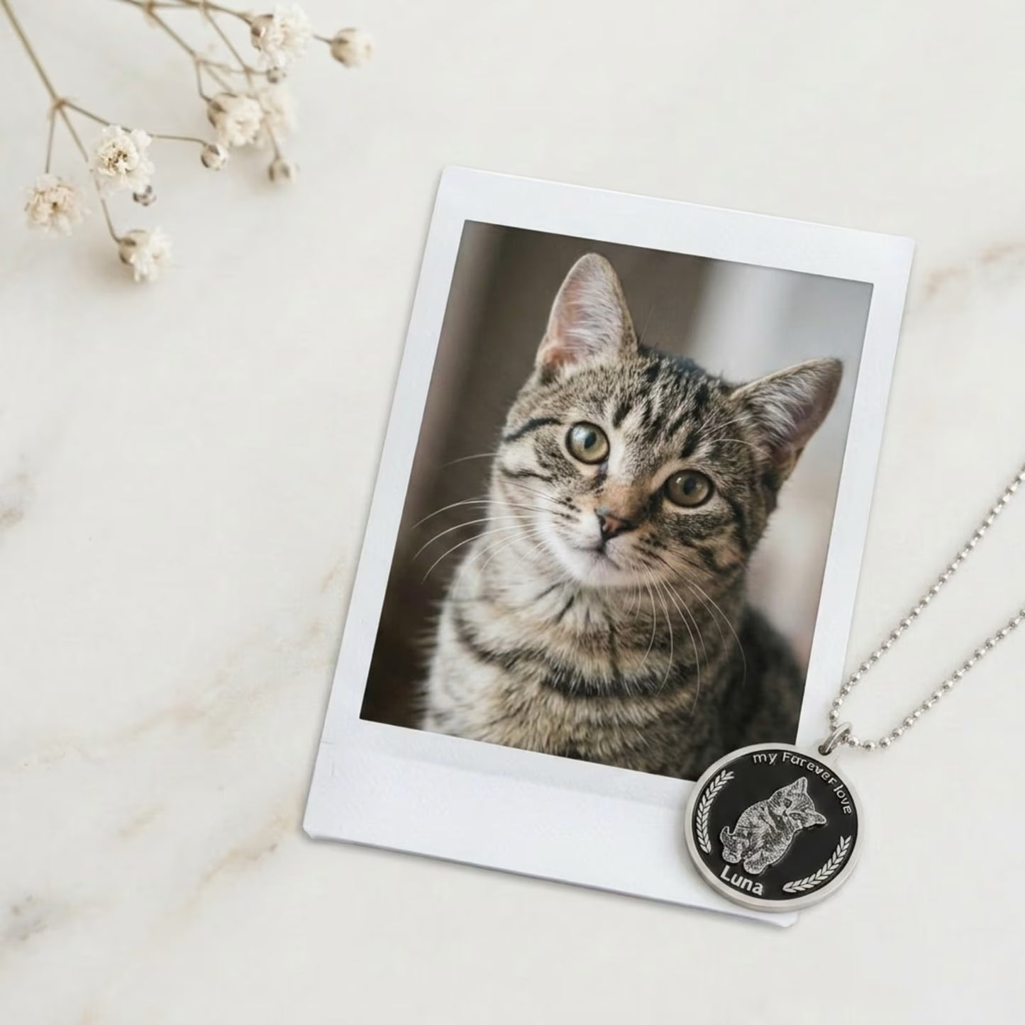 Black enamel silver engraved cat portrait necklace 0.8 inch on marble with polaroid reference — Furfond